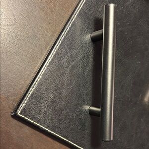 Sleek Black Metal Handle
